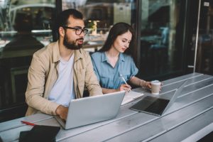 Couple researching home buying options